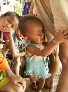 boy%20clinging%20to%20mother[1]