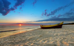 sunset-on-the-beach-desktop-wallpaper-sand-boats[1]